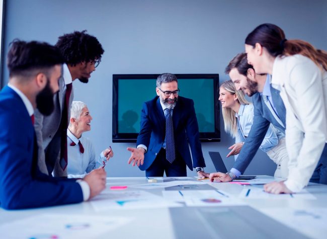 business-people-conference-in-modern-meeting-room-Y8LSMTC-2-scaled.jpg